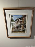 Overall view of framed print on wall