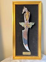 Framed dagger display full view showing frame, dagger and plaque