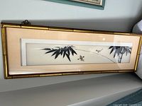 Front view showing entire framed artwork, composition and frame style