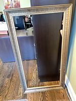 Full view of gilded frame front