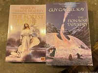 Front covers of both paperback books