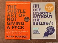 Front covers of both books