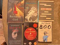 Front covers of all six paperback books