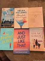 Front covers of all six paperback novels arranged in two rows