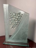 Front view showing folded form and pebble inlay