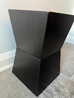 Three-quarter view showing overall geometric form and finish