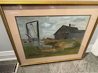 Front view of framed oil painting with mat and frame visible