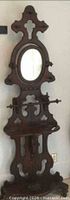 Full view of carved mahogany hall stand showing overall form and size