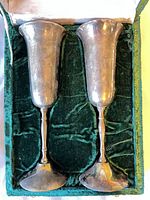 pair of silver-plated goblets in fitted case, overhead view