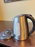 Russell Hobbs kettle with lid and power base displayed on tabletop