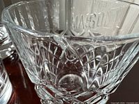 Close view of cut-glass tumbler pattern and clarity