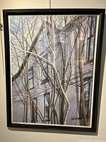 Full view of framed print hanging on wall