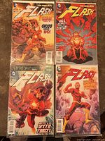 All four The Flash issues #14-17 bagged and boarded