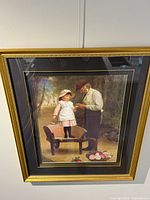 Front view of framed print under glass