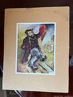 Full view of mounted print on dark surface