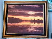 Front view of signed framed print showing artwork and frame details