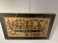 Front view of framed batik-style textile artwork