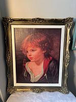 Front view of framed child portrait print
