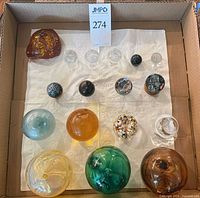 Box with all glass spheres, plastic rock, stands