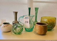 Group shot of all eight items on shelf