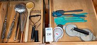 Overview of all utensils arranged in drawer