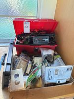 Overall lot with red toolbox and basket of packaged electrical items