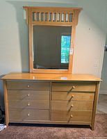 Front view of dresser with attached mirror