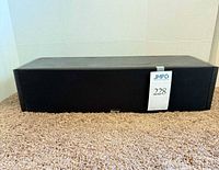 Front view of Boston Acoustics VRC speaker with grille