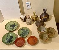 Group shot of all eleven pottery pieces