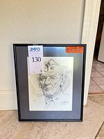 Front view of framed sketch showing full artwork, size tag visible