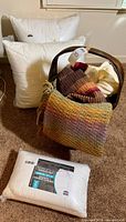 Overall lot with basket, blankets, pillow inserts