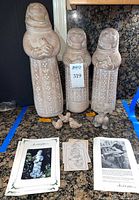 Full set of seven Isabel Bloom concrete sculptures with literature