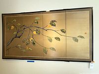 Full view of four-panel folding screen on wall