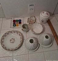 Full set of porcelain and glass items laid out