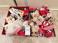 overview of two open boxes filled with assorted soft Christmas ornaments