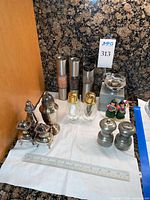 Group shot showing all shakers and mills