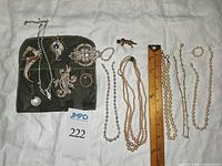 Group shot of all items on fabric background with ruler for scale