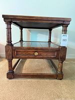 Front view of Century Furniture side table showing top, shelf, legs and drawer closed