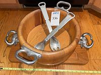 Top view of bowl inside board with utensils crossed