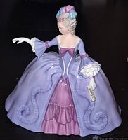 Front view of Franklin Porcelain Marianne figurine in lavender gown