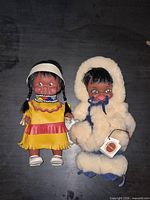 Both dolls side by side showing size, outfits and accessories