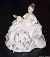 Front view of Royal Doulton My Love figurine showing gown details