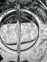 Close-up of Rose Point etching and central divider