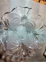 Top view of clear and frosted tulip-shaped bowl showing petal design