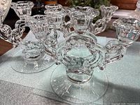 Front view of two keyhole candelabra showing design and clarity