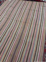 Full view of striped Jajeem rug showing overall pattern