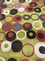 Full view of rug showing entire circle pattern