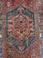 Close-up of medallion and color palette