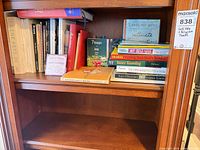 Wide view of shelf showing entire lot of books