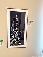 Full view of framed wall art hanging